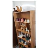 Contents of shelf lamp shades, doll stands,