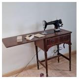 Vintage Westinghouse sewing machine with cabinet