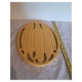 Vintage mustard yellow cast Iron trivet