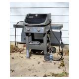 Weber gas grill with cover and wide wire brush
