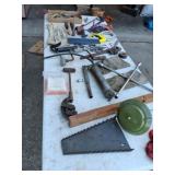 Tools, chain, John Deere belt, pipe wrench and