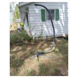 C-shaped stand designed for hanging a hammock