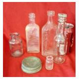 Zinc lids and vintage glass bottles