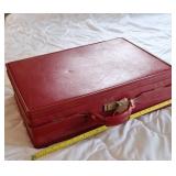 Vintage hard red leather suit case
