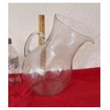 Tilted handled glass pitcher
