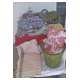 Rag rugs, trash can and reusable bags