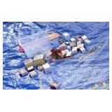 Tote full of Christmas Hallmark keepsakes and