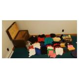 Trunk w sweaters , purses, jewelry box, mock