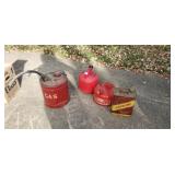 3 metal gas cans and plastic