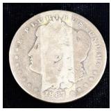 1887-O Morgan silver dollar,