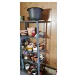 Storage shelf w contents mostly Planters