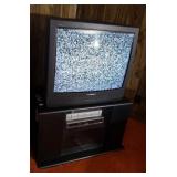 Phillips magnavox TV w stand dvd player and RCA