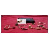 Gold and silver tone cuff links and tie tacks,