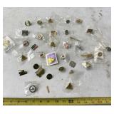 Several pins from John Deere, Nascar and others