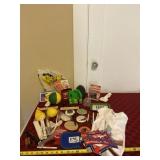 Can coozies, shirt, rulers and more