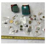 John Deere calculators and pins