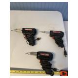 Three Weller electric soldering guns