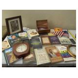 Clocks, books, framed picture and Nokia phone