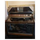 Rowe Ami  Jukebox w 45 records , works depends on