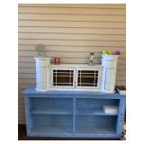 Blue and white wooden shelves, books and decor