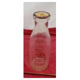 Heischmidt Dairy 1 qt milk bottle
