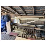 All wood in pile and on side wall along with