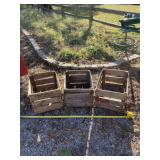 Three wooden crates