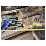 Hinges, caulking guns,  paint brushes and curry