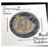 hand struck in copper partial coin