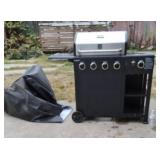 New, Kenmore 4-burner gas grill with a side