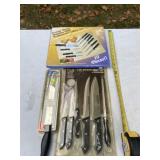 All new 7ï¿½ bread knife, 10 piece cutlery set and