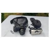 Canon t50 camera,  and sure shot, stored in shed