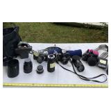 Mamiya/se kor camera with several zoom lenses and