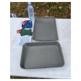 Cake pan, cookie sheet and metal footed trivets