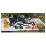 Small tote, cd player, calculators, Polaroid