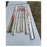 Aluminum vinyl door sweeps and threshold