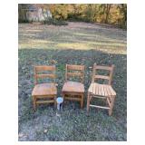 Three small wooden chairs