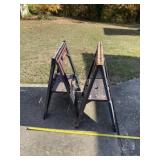 Two Storehorse brand fold up sawhorses