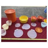 Tupperware bowls with some lids