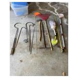 Shepherd hooks, rake, axe, water meter wrench,