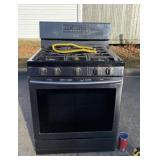 Samsung gas stove 30 wide x 27 deep x 46.5 tall .