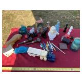 Empty Avon cologne bottles, church bank and glass