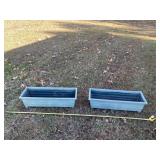 Two green plastic planters