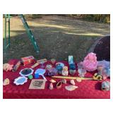 Candle holders, doll and doll clothes, sea