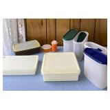 Tupperware containers with lids, salt shaker and