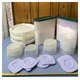 Tupperware containers with lids and contents