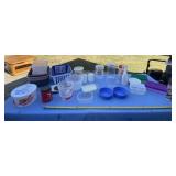 Plastic containers some with lids