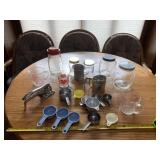 Glass containers with lids, garlic press, sifter