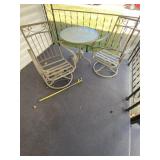 Adjustable height glass top patio table and two