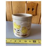 Crock with soda taps in it and painted chicks
